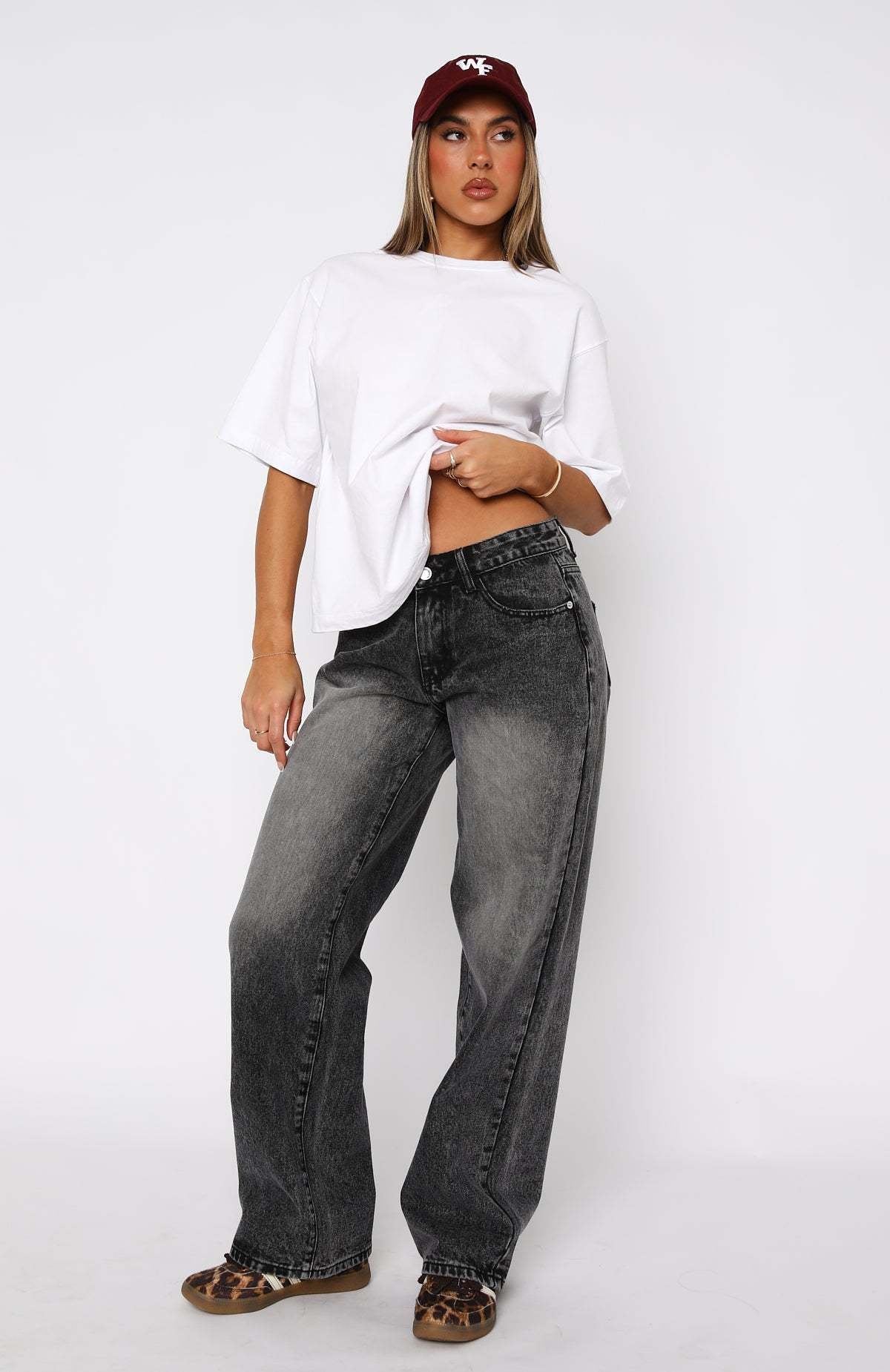 Women’s mid-waist straight leg loose denim jeans.